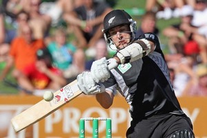 Nathan McCullum looks for runs during his unbeaten half century at McLean Park yesterday. Photo / Getty Images