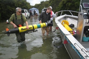 The underwater vehicle used to probe the lake and an image of the terraces rediscovered at 60 metres. Photo / Supplied