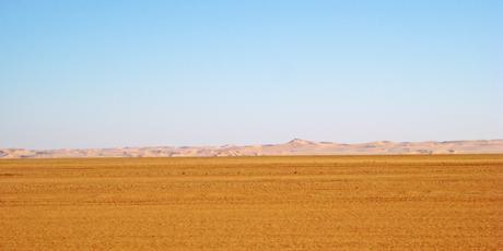 Libya's vast, desolate surroundings hide the remains of an ancient ocean of stone. Photo / Jill Worrall