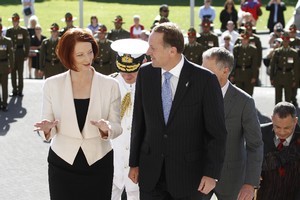 Julia Gillard and John Key enter Parliament. Photo / Mark Mitchell