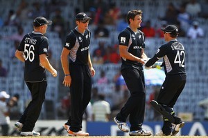Black Caps bowler Hamish Bennett is congratulated by team mates after bowling Steve Tikolo of Kenya during their 2011 ICC World Cup Group A match. Photo / Getty Images