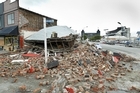 A collapsed building near AMI Stadium in Christchurch. Photo / Getty Images A collapsed building near AMI Stadium in Christchurch. Photo / Getty Images