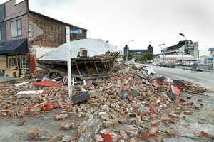 A collapsed building near AMI Stadium in Christchurch. Photo / Getty Images