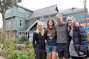The Smith family with their Hambledon mansion in the background before the demolition. Photo / Mark Mitchell