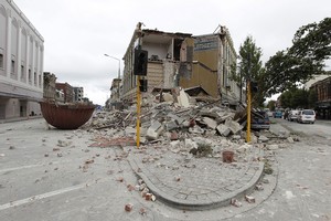 Collapsed buildings in Manchester St show the severity of the magnitude-6.3 jolt. Photo / Getty Images