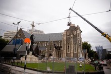 Recovery crews look over the Christchurch Cathedral following the earthquake. Photo / Dean Purcell