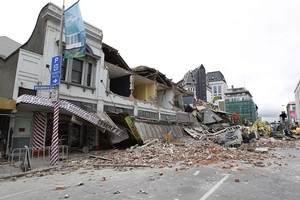 Collapsed buildings and debris along Manchester Street in Christchurch. Photo / Getty Images