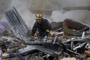 A rescue worker at the CTV building in Christchurch on the day of the 6.3 magnitude earthquake. Photo / Simon Baker