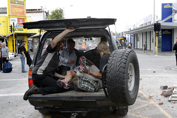 A man is rushed to hospital after being rescued from a collapsed building on Manchester Street. Photo / Getty Images