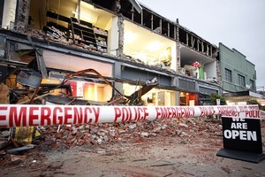 Retail shops in Merivale are left open to the elements following yesterday's massive earthquake in Christchurch. Photo / Getty Images
