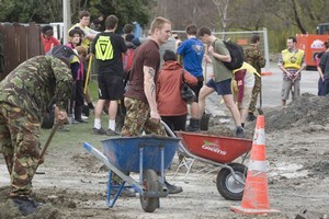 Volunteers cleaning up in Kaipoi after September's earthquake. Photo / Mark Mitchell