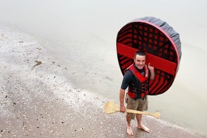 Justin Newcombe prepares to embark at Pt Chevalier beach. Photo / Steven McNicholl