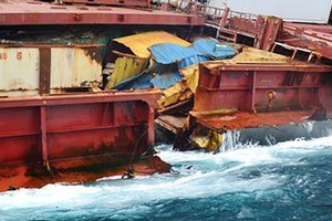 Salvors are preparing for the Rena to become further damaged in a storm set to batter the stricken boat over the weekend. Photo / Maritime NZ
