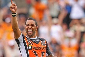 Benji Marshall of the Tigers celebrates kicking the winning drop-goal in extra time. Photo / Getty Images