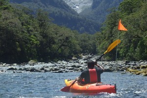 Paddling towards Harrisons Valley, with the Pembroke Glacier looming above. Photo / Joe Dodgshun