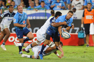 Filo Paulo of the Blues tackles Bjorn Basson of the Bulls during the 2012 Super Rugby match between Vodacom Bulls and Blues from Loftus Versfeld on March 10, 2012 in Pretoria, South Africa. Photo / Getty