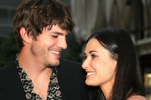 Demi Moore with ex-husband Ashton Kutcher in happier times. Photo / Getty Images