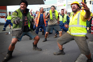 Wharfies perform a haka during the Ports of Auckland protest march.
Photo / Doug Sherring