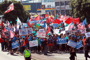A protest march regarding Ports of Auckland industrial action. Photo / Doug Sherring