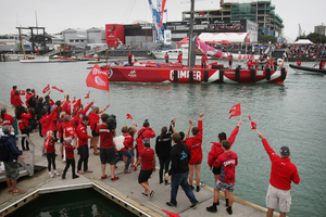 Volvo Ocean racing New Zealand crew Team Camper celebrate in front of a large crowd that gathered at the Viaduct after arriving in Auckland after leg four. Photo / Greg Bowker