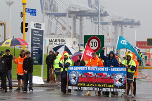 Accusations of aggression came from both sides of the dispute as more than 100 port workers and their supporters swelled the picket lines yesterday. Photo / Paul Estcourt