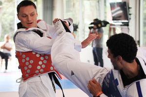 Logan Campbell (left) works out with fellow Olympian Vaughn Scott. Photo / Greg Bowker