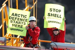 Actor Lucy Lawless and Greenpeace New Zealand activists protest to stop a Shell-contracted drillship from departing Port Taranaki for the remote Arctic. Photo / Supplied