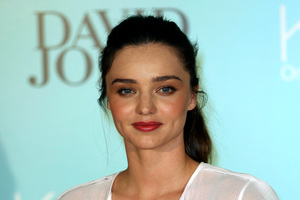 Miranda Kerr will conduct a free yoga class for 500 fans who upload their own I Will If You Will challenge.
Photo / AP, Rob Griffith