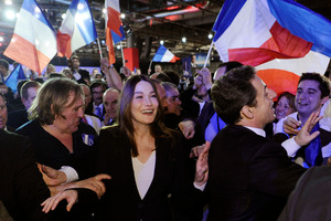 France's President Nicolas Sarkozy leaves a meeting with Carla Bruni Sarkozy and French actor Gerard Depardieu in Villepinte. Photo / AP
