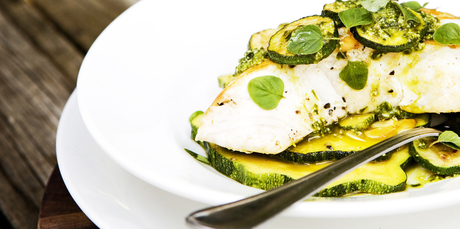 Baked blue cod, kamokamo and parsley pesto. Photo / Babiche Martens
