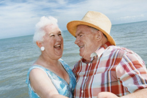 Close up of a Senior Couple Dancing at Water's Edge