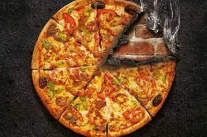 Hell's 'Pizza Roulette' comes with a warning 'It doesn't cost. But someone pays.' Photo / Hell Pizza