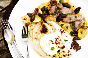 African spiced hummus with lamb and olives. Photo / Babiche Martens
