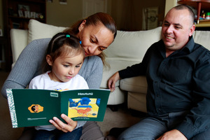 Marama and Paul Davidson with Teina, 3, who is used to conversing in te reo Maori with her parents. Photo / Steven McNicholl