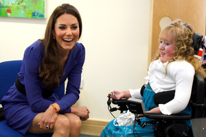 Britain's Duchess of Cambridge meets Bethany Woods in a music class during a visit to The Treehouse in Ipswich. Photo / AP
