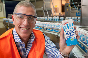 Fonterra business manager beverages, Craig Irwin, reveals the Milk for Schools 250ml carton. Photo / Supplied