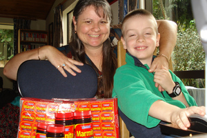 Louise Martin and her autistic son Daniel, who is sensitive to foods and eats Marmite every day. Photo / Supplied