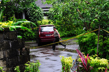 A police officer at the compound where the terrorist suspects were shot dead. Photo / AP 