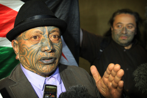 Tame Iti makes a point to the media outside the High Court at Auckland. Photo / Greg Bowker