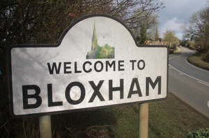 A sign welcomes visitors to Bloxham in Oxfordshire, where Jim Eagles' ancestors hail from. Photo / Alison Smith