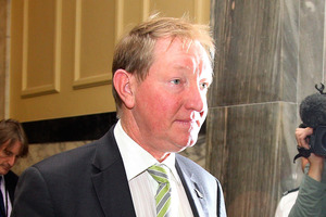 Nick Smith fronts up to the media after giving his resignation at Parliament today. Photo / Getty Images