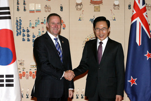 John Key is greeted by South Korean President Lee Myung-bak. Photo / Getty Images