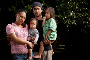 Tammylee Rapana and her partner Theodore, with their two small children. Photo / John Cowpland