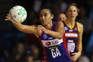 Maria Tutaia of the Mystics passes the ball out during the ANZ Championship match between the Mystics and the Firebirds in 2011. Photo / Getty Images.