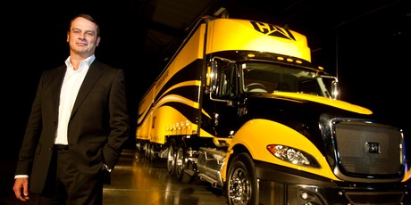 Gough's Karl Smith with the Cat CT630 truck. Photo / Richard Robinson