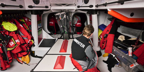 A quiet change of watch onboard CAMPER with Emirates Team New Zealand during leg 5 of the Volvo Ocean Race 2011-12. Photo / Hamish Hooper.