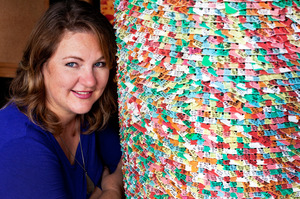 Artist Carrie Bolton with her bread tag artwork. Photo / Babiche Martens