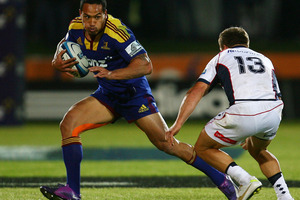 Hosea Gear of the Highlanders makes a break during the round six Super Rugby match between the Highlanders and the Melbourne Rebels at Rugby Park Stadium. Photo / Getty Images.