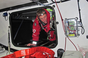 David Swete checks for leaking onboard Team Sanya. Photo / Andres Soriano-Team Sanya
