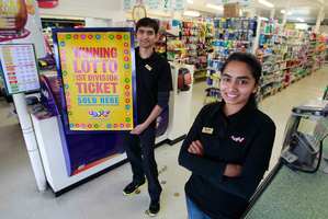 Nilesh Patel and his wife, Rina, who work at the Four Square in Te Kauwhata, where the latest winning lotto ticket was sold.
Photo / Steven McNicholl
